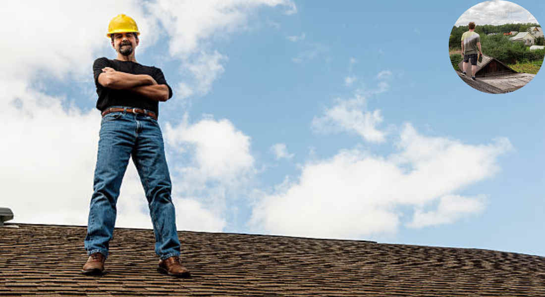 a man standing on the roof of a house